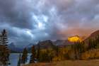 Shoulder of Mount Cleveland bathed in golden sunrise light in Glacier National Park-Montana-USA Art Print